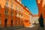 Placeholder: An orange colored construction zone in town in Baroque art style