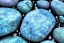 Placeholder: Blue raindrops on a rock, close up view, photo quality, stone marble, ultra realistic