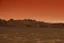 Placeholder: It was an inhospitable locale, filled with vast deserts of black sand and huge plains of dark granite. There was no water to be found anywhere on the plane, and no sunlight filled the blood-red sky, -brown, -plants