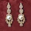 Placeholder: drop diamond and pearl earrings on a velvet background, art noveau, filigree, floral, breathtaking, highly ornate, delicate, intricate, photorealistic, high fashion, fine jewellery, luxury, designer