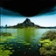 Placeholder: Sublime foto close-up polaroid ad alta definizione di una montagna rocciosa, un lago, surreale, colors, cityscape scifi, collage art, dadaism, sublime, splimapys nero, cielo nero, acqua nera riflette un sole nero, macabre piante circondano il lago, alghe, hypermaximalist, Max Ernst style, strangeness, intricate, hypnotic, obsessive, Yves Tanguy, 8k, deep 3d field, very accentuated details of the rocks and sht frn, eerie, artistic photo, shot on Hasselblad, large format film, medium format film