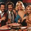 Placeholder: Comedy movie shot, happy, hot, ultra realistic, dine, horns, ultra realistic hot blonde women, party, pieces of meat, organs, ail, dynamic, very excited people, hypermaximalist figures, light, 1970's Italian comedy movie, lively, ornate, 4k, photorealism