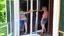 Placeholder: lady upset with installer when screen door is too big and won't fit in the framing