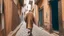 Placeholder: Rear view of an elderly Moroccan walking in a Moroccan alley