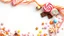 Placeholder: A beautiful image with a white, orange, and pale blue background theme, filled with chocolate, lollipops, and various colored pastels and candies on the left side of the image.