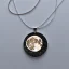 Placeholder: necklace with a simple, elegant design featuring a single, shimmering polyester in moon pendant