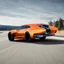 Placeholder: award winning car and driver photograph of a futuristic station wagon fighter-jet hybrid designed by only one vehicle per image painted metallic orange traveling at a high rate of speed, jet intake off of front center of vehicle and jet exhaust out the rear with bright blue flame, bilaterally symetrical, more a high speed road vehicle