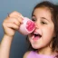 Placeholder: A girl eating a milkshake