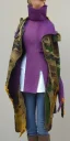 Placeholder: Image shows wholly a young fleshy Brunette woman. average body type. Mantle is sewed of recycled Denim and sewed together of camouflage pieces. Camouflage colors are orange,terracotta, cream and purple. Cream latex gaiter. More yellow(Munsell)!!!Big bright purple/khaki felt tippet and cream or blue or lilac colored-hood. mantle is merged with satchel. . AKG-style headphones (gold rings!) is merged with small felt cap with small visor. Style: Haute Couture in 1936, Paris fashion in 2023.