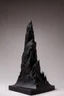 Placeholder: an ominous small statuette made of ebony in the form of a mountain