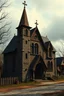 Placeholder: please create a creepy looking church building in a small fantasy town from midevil times