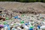 Placeholder: A photo of a landfill or waste disposal site to represent the issue of non-recyclable filters.