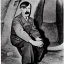 Placeholder: Adolf hitler, in bunker, on knees, monocrome,1945