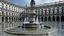 Placeholder: La plaza central, pavimentada con grandes losas de granito, estaba presidida por una fuente de piedra tallada con figuras mitológicas que derramaban agua de manera casi imperceptible, fusionándose con la lluvia. Alrededor, las fachadas de los edificios neoclásicos mostraban columnas y capiteles desgastados, mientras los tejados inclinados de pizarra dirigían las gotas hacia gárgolas de piedra que escupían agua en los desagües.