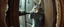 Placeholder: weird ass squirrel burglar breaking open a door with a crow bar , pinhole cam, airbrush 3d rendering, in the style of John Atkinson Grimshaw , torn edges on border