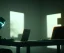 Placeholder: a hacker coding on his laptop in a dark room, golden fog