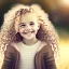 Placeholder: A cute little girl, curly blonde hair, the look on her smiling face.