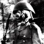 Placeholder: Japanese war general wearing a gas mask holding an AK 47 during world war 2 with a hacker type backround