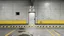 Placeholder: wall design for parking garage, concrete, yellow painted hazard lines, weathering and water stains, in middle is an exit doorway with small window, with a sign is above. rough painted hashmarks and parking lines, add signage found in a parking garage.