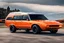 Placeholder: a military fighter jet station wagon hybrid painted orange metallic