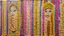 Placeholder: A Wide Panel in which 5-6 potraits are deveped with Wool threads tapestry artwork connected with each other through threads,