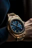 Placeholder: Generate an image of an Audemars Piguet gold watch on a wrist, emphasizing how it complements a person's style and adds a touch of sophistication.