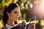 Placeholder: cute brunette woman listening a training in sunshine