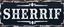 Placeholder: large and wide hand painted old western sign that reads: "SHERRIF" white on black with inset boarder stripe in white aged