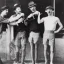 Placeholder: a group of four male friends with very small shorts on and large hats and holding trombones