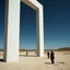 Placeholder: Photograph of odd open space, metaphysical, giant object, very detailed, persons, Yves Tanguy, hasselblad h6d400c --ar 85:128 --v 6.0