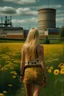 Placeholder: Back view of a beautiful blonde lady with long free hair and wearing Swedish women's international football shorts and shirt, strolling across a grassy field full of wildflowers towards a huge brewery industrial complex.