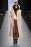 Placeholder: DC Fashion runway Winter Clothes design by Superman style beige tones