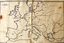 Placeholder: an ancient printed road map that was black and white, but has since been stained and weathered