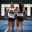 Placeholder: Two female athletes wearing shorts.