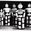 Placeholder: Old photo of robots and Creepy people