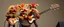Placeholder: masterfully Gnoll muppet puppet band all playing on one big guitar
