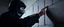 Placeholder: close up on guard pointing at professional ninja thief climbing a wall during lightening,