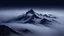 Placeholder: looking down from space at a misty mountain coming through the mist at night