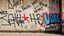 Placeholder: old wall. Graffiti.