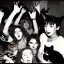 Placeholder: Old photo of 1990s rave with sooty and cats