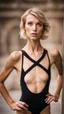 Placeholder: beautiful anorexic woman, total shot, short shiny black triathlon swimsuit, short blond wavy bob hair, blurred concrete background