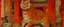 Placeholder: An orangish red fiery temple with a scorching tiger painted by Guo Xi