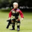 Placeholder: G.i. Joe toy camouflage doll chubby Donald Trump sunburn face with boots full body in package high resolution 2019, in a box with gun