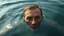 Placeholder: A Man Seriously Looking Straight With Only His Head And Eyes Are Appearing From The Surface Of The Water.