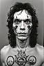 Placeholder: richard ramirez vocal worshipper of Satan His smile, riddled with rotten and missing teeth, was compared to that of a “killer clown bought his infamous AC/DC cap. He was so obsessed with pentagrams that he had one tattooed on the palm of his left hand,