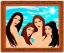 Placeholder: Very sensual gorgeous "Las tres gracias" Post modern art. 3 young white woman brunette hair maiden dressed in blue posing sensually with plaits,In and out of an empty surreal picture frame. Background a desert, sunshine beams divine bright soft focus holy in the clouds steampunk engine.