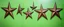 Placeholder: these shapes embossed in rusty metal star on smooth contrasting background