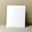 Placeholder: A photo of a white folded card, 5.5 by 4.25 inches. The card is laying vertically on a beautiful surface.