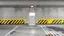Placeholder: wall design for parking garage, concrete, yellow painted hazard lines, weathering and water stains, in middle is an exit doorway with small window, with a sign is above. rough painted hashmarks and parking lines, add signage found in a parking garage.