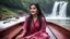 Placeholder: Hyper Realistic Photographic View Of A Gorgeous Pashto Girl (Wearing Simple Maroon Colored Dress & Wearing Plain Pink Dupatta On Her Neck) Happily Sitting & Smiling On A Boat & Showing Her Long Black Hair On The River With Beautiful Waterfall At The Back, At Heavy Rainy Weather Showing Dramatic & Cinematic Ambiance.